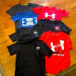 7 adult size small sunder Armour shirts